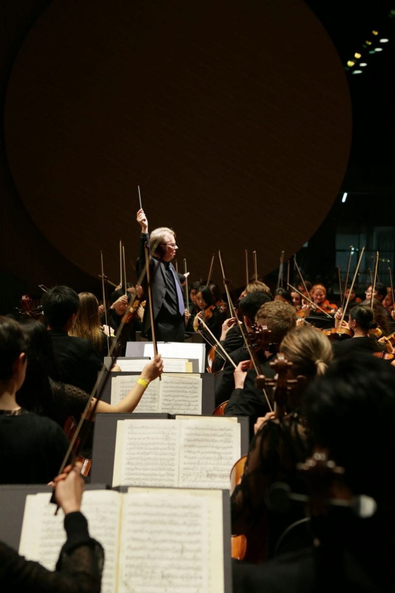 Head of Orchestral Studies Richard Davis leads the University of Melbourne Symphony Orchestra during the launch of The Ian Potter Southbank Centre on 1 June, 2019. By Sav Schulman.