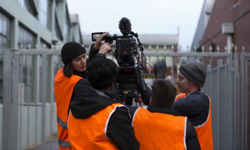 The crew of Love is a Lunatic City on set. Image supplied.