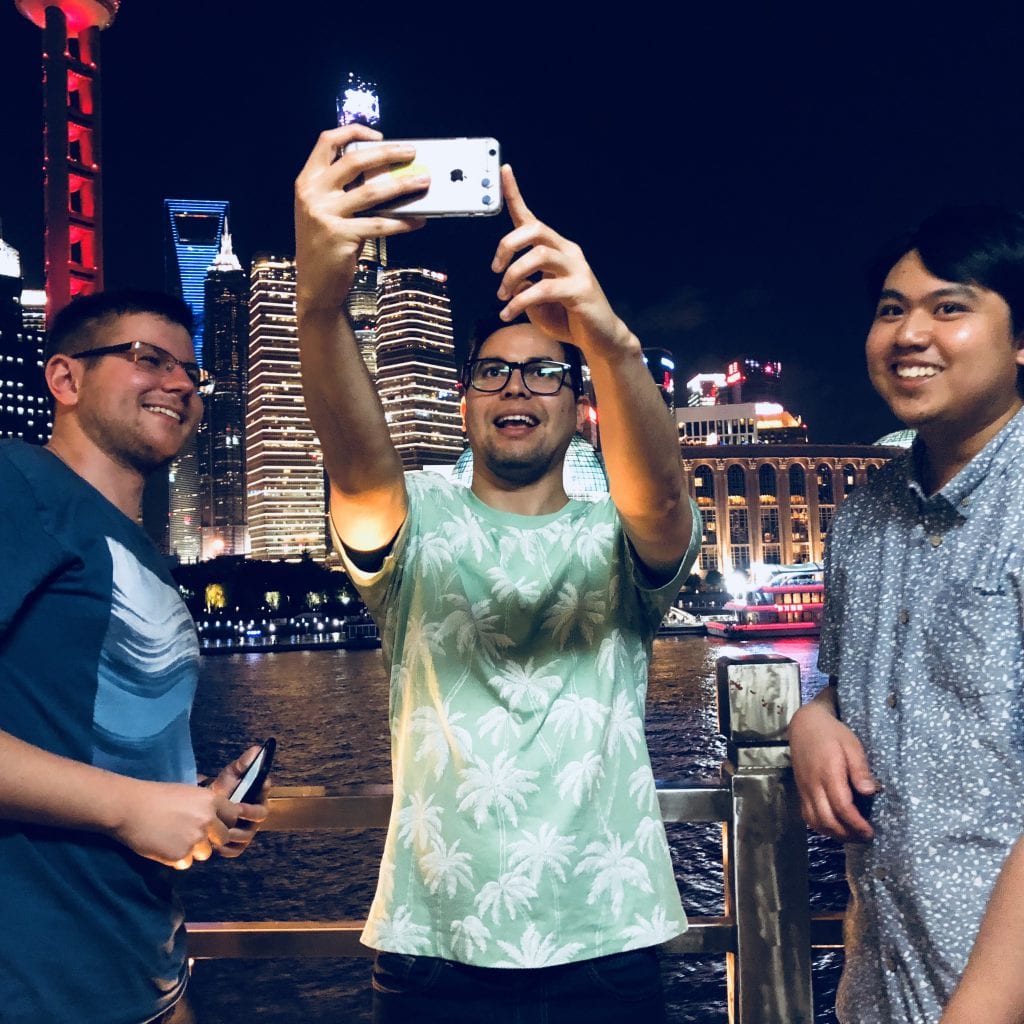 L-R: Violinists Michael Machlak, Jose Luis Tochon Quintero and Aja Casama get their selfie-game on in Shanghai. By Paul Dalgarno.