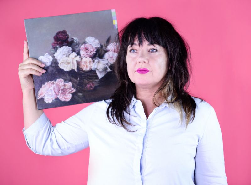 Dr Kate Daw poses with a painting by Colleen Ahern for the Meet VCA Art feature, as part of the ART150 celebrations in 2017. By Giulia McGauran.