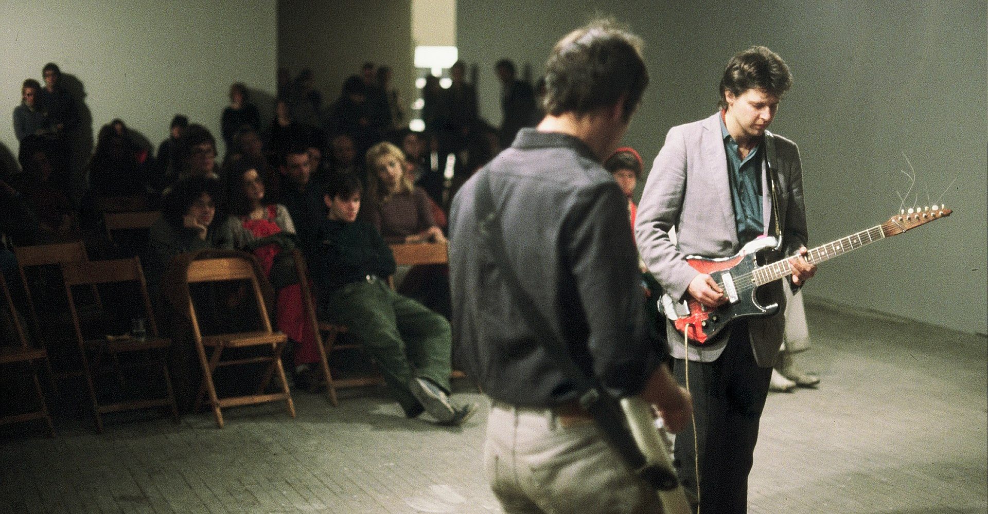 Glenn Branca performing at Hallwalls in the 1980s. Image courtesy of Hallwalls’ archive. Wikimedia Commons.