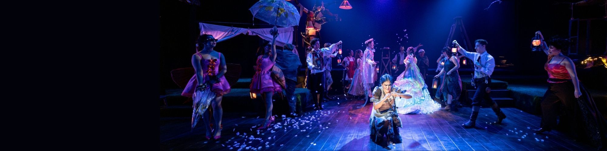 Performers on stage of Into the woods