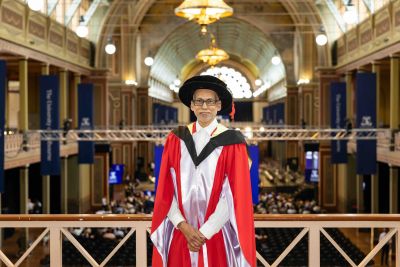 Man stands in academic dress