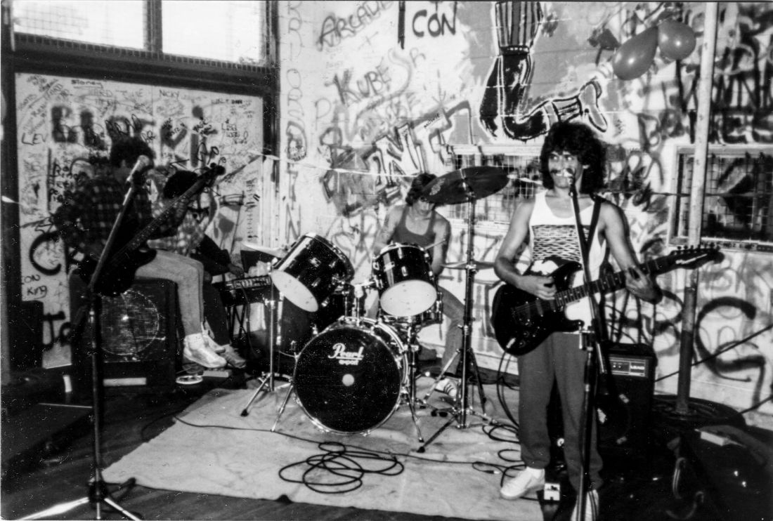 Koori Youth Band perform at FCYC Fitzroy in 1985. Earl Mow on bass guitar, Wally Arden on Drums and Dave Arden on guitar/vocal. Image supplied.