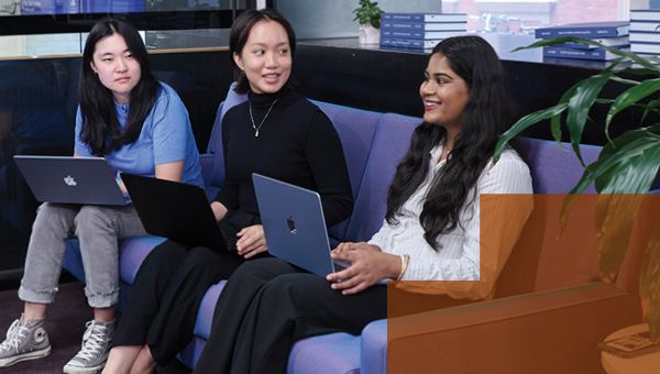 Students sitting on laptops